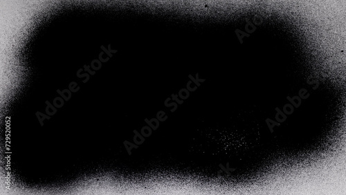 Black Spray Paint On A White Background photo