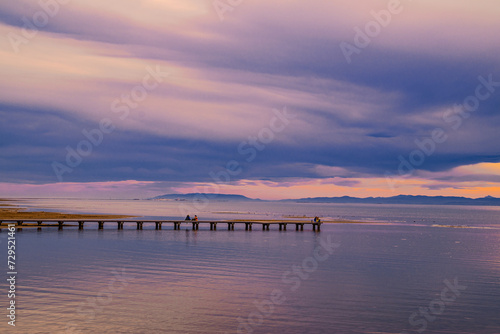 Ebro Delta  seen from Trabucador beach  with the footbridge in the background on a cloudy day