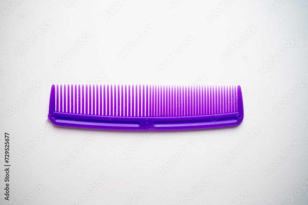 multi-colored hair combs on a white background multi-colored hair combs on a white background