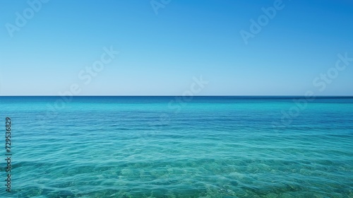 Beautiful ocean horizon line with clear blue sky