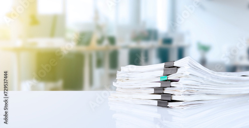 stack of reporting paper documents on a business table in the office, business documents for annual reports. Business analytics. Business office concept, soft focus.