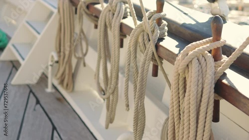 ropes on the deck of a ship, close-up of a rope winding up a winch. close-up in real time photo