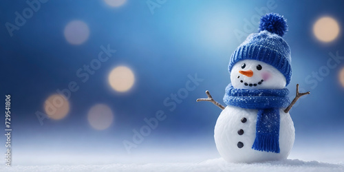 A Snowman with a Blue Hat and Scarf, Smiling on a Snowy Surface with Bokeh Lights © Lucas