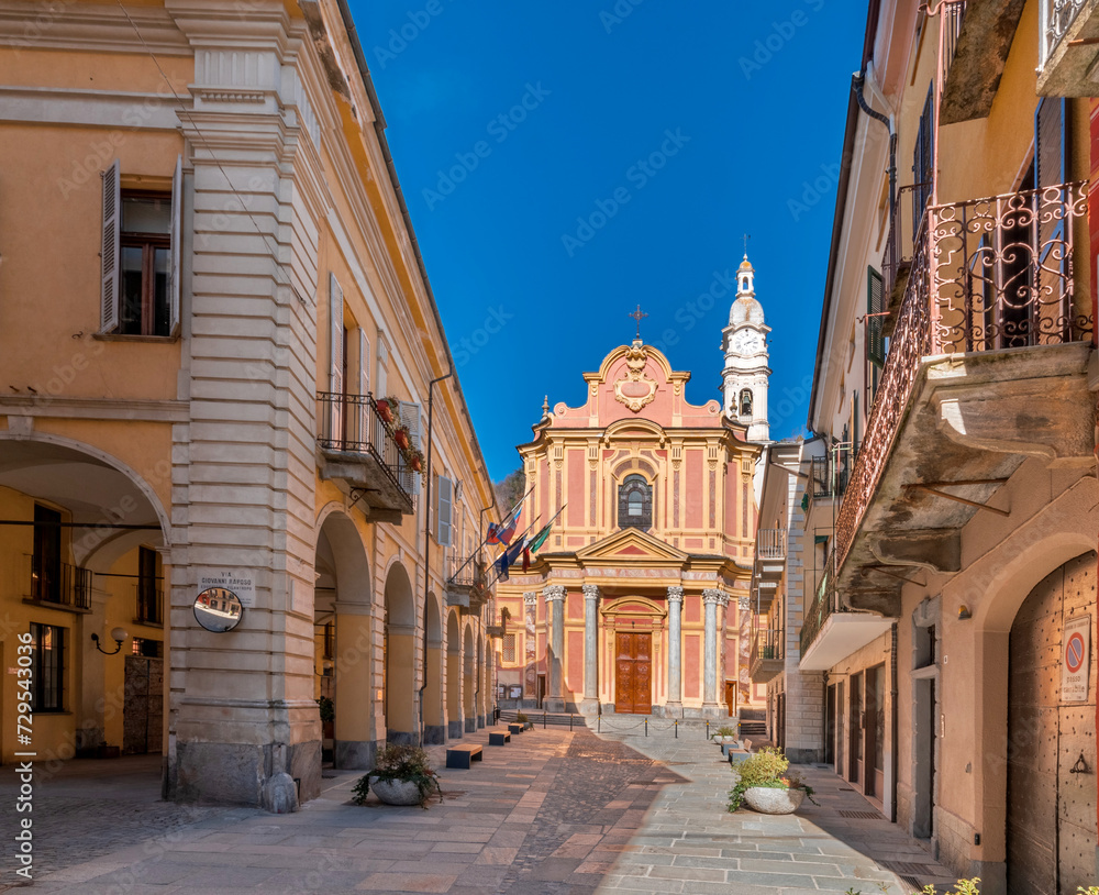 Caraglio, Piedmont, Italy - February 02, 2024: Piazza Giolitti with the Town Hall and the parish church of Maria Vergine Assunta