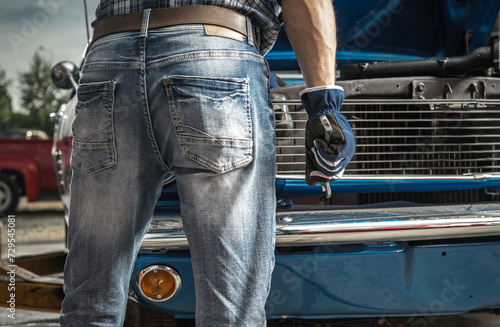 Caucasian Man Working on His Classic Car