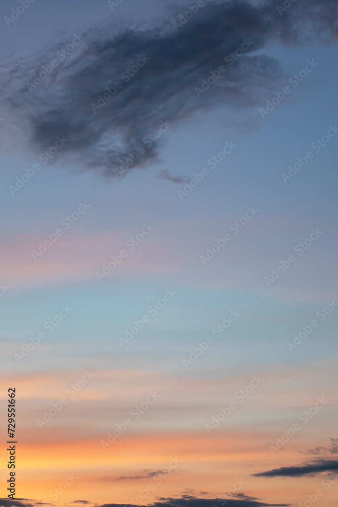Naklejka premium Blue and pink clouds in the evening sky