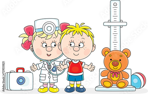 Cute little girl holding a medical stethoscope and playing doctor with a funny boy among toys in a playroom of a nursery school, vector cartoon illustration isolated on a white background