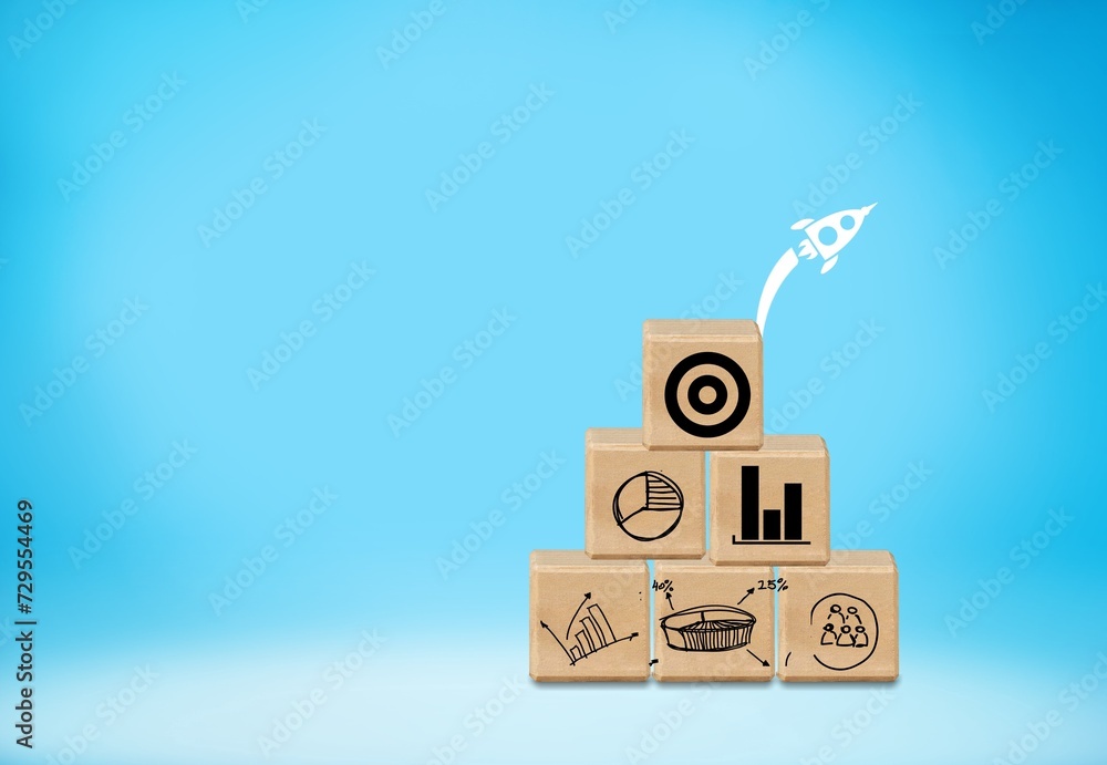 Rocket launching wood cube with set of business icon