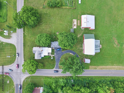Aerial Countryside Serenity: Green Landscape and Farm Buildings