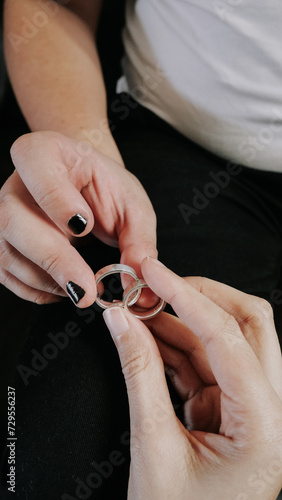 Couple Holding Rings Married