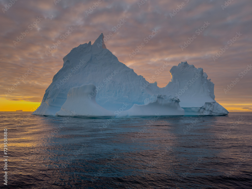custom made wallpaper toronto digitalA huge high breakaway glacier drifts in the southern ocean off the coast of Antarctica at sunset, the Antarctic Peninsula, the Southern Arctic Circle, azure water, cloudy weather