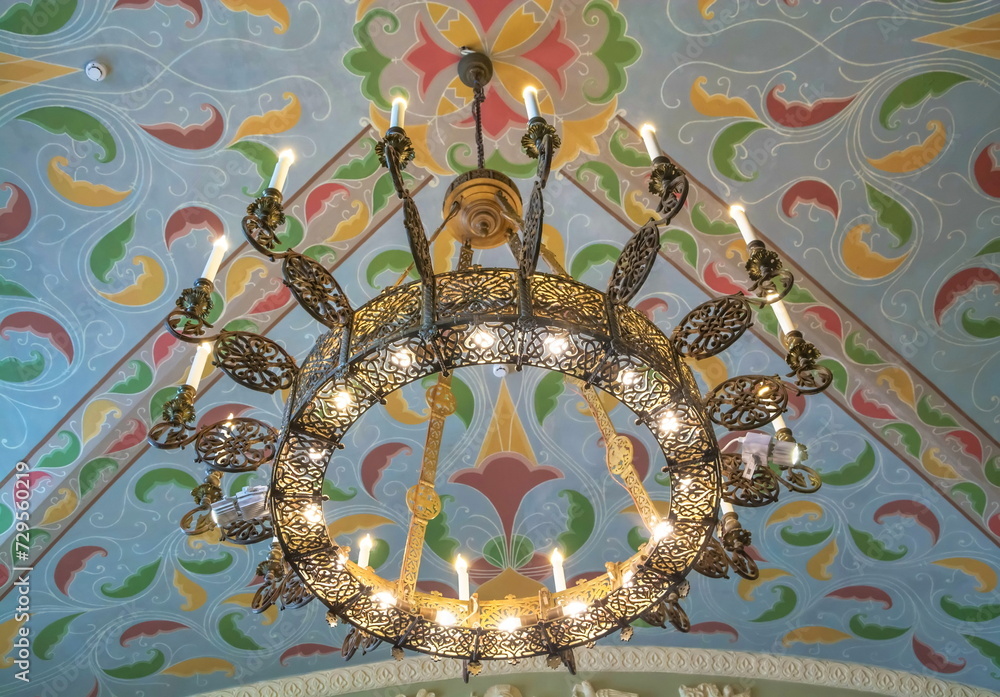 Antique wrought iron openwork chandelier