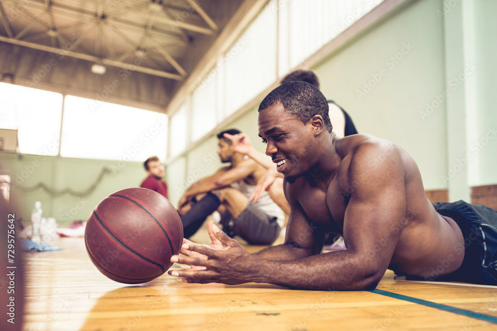 © Marko Geber - Men laughing and resting during gym workout