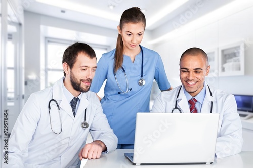 Doctors teamwork collaboration with documents in hospital