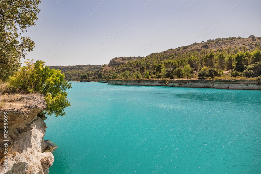 Lagunas de Ruidera located in Albacete Spain, with turquoise waters and blue sky