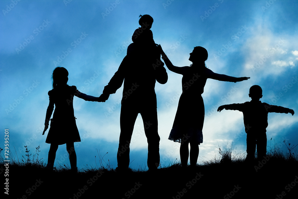 happy family by the sea on nature silhouette background happy family by the sea on nature silhouette background