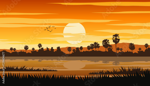 Thai rural life and pond on sunset time with palm tree