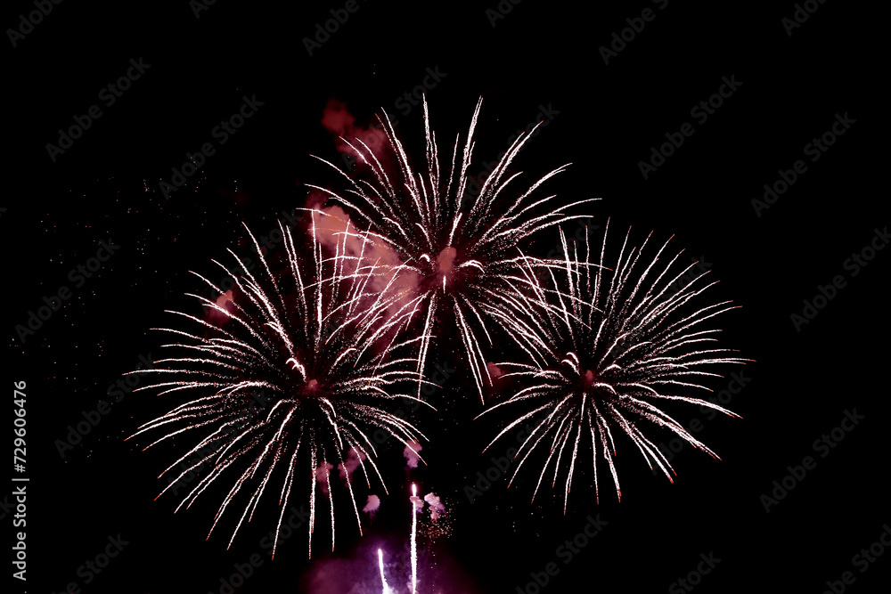 Fireworks with a dark black background, Bright beautiful colorful fireworks. Festival concept. Fireworks with a dark black background, Bright beautiful colorful fireworks. Festival concept.
