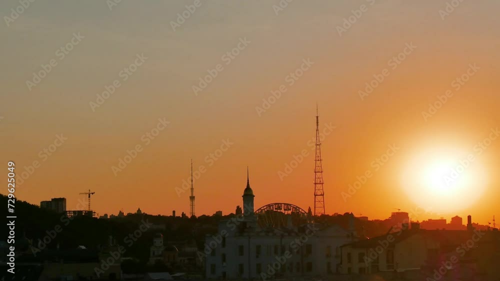 City sunset view with horizon and fare wheel