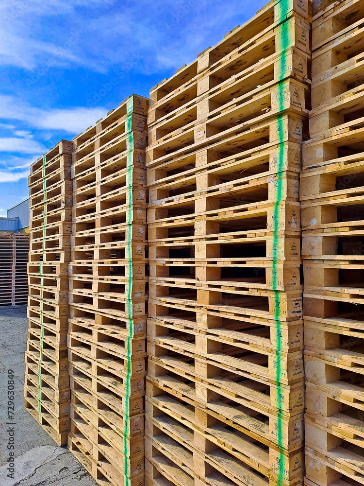 stack of wooden pallets for logistic shipments
stack of wooden pallets for logistic shipments