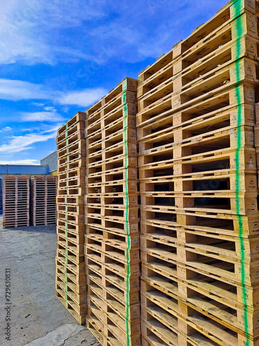 stack of wooden pallets for logistic shipments
