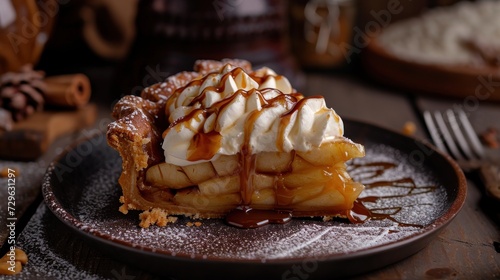  a plate topped with a piece of pie covered in whipped cream and caramel drizzled on top of a chocolate sauce drizzled apple slice.