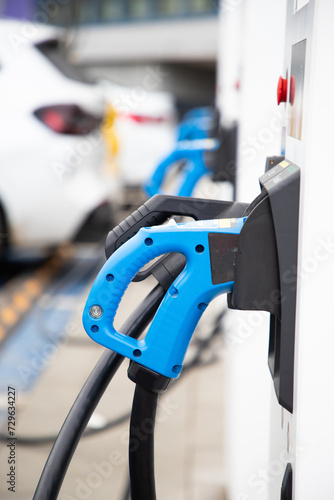 Wallpaper Mural charging an electric car on the street Torontodigital.ca