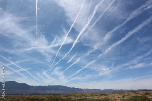 Blue Sky art with contrails