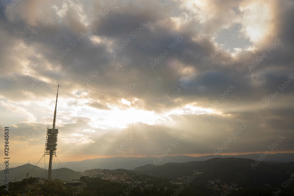 Tibidabo telecommunications tower in Barcelona on top of the mountain near the city Tibidabo telecommunications tower in Barcelona on top of the mountain near the city