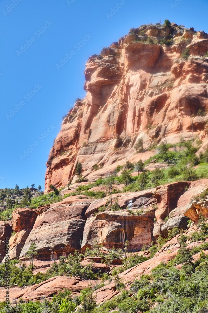 Fototapeta premium Majestic Sandstone Cliff in Sedona with Blue Sky