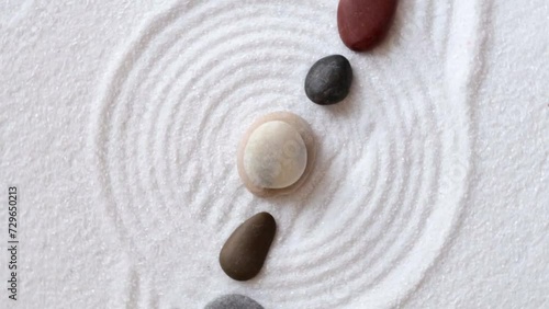 Zan pattern with the stones and white sand photo
