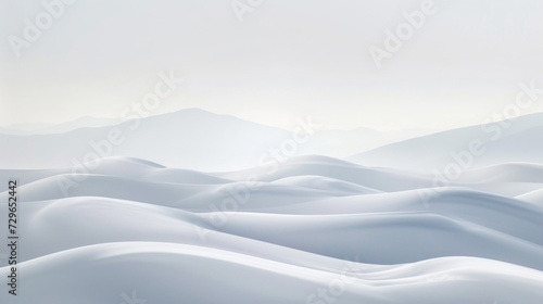 Amidst the foggy winter air, a majestic mountain range looms over a snowy landscape, blending seamlessly with the rugged dunes of nature's outdoor canvas
