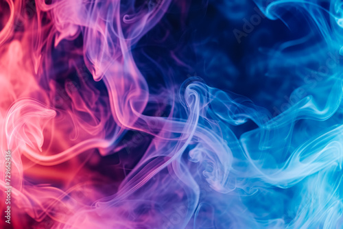 Colorful abstract smoke plumes in shades of blue and red, creating a fluid, dreamlike image with a dynamic interplay of colors.