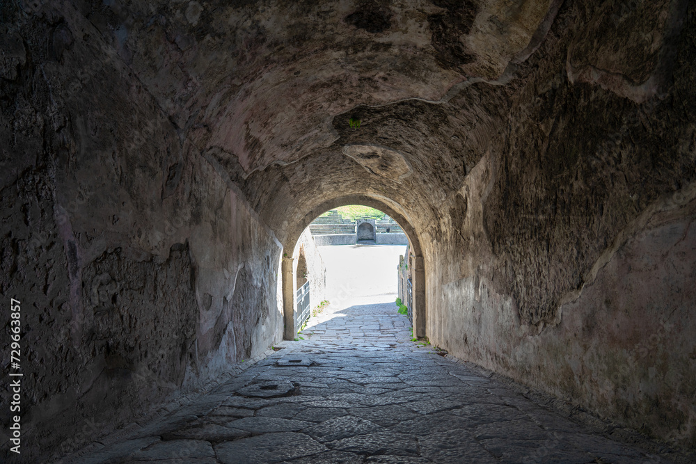 one of the access tunnels to the amphitheater in the archaeological park of pompeii