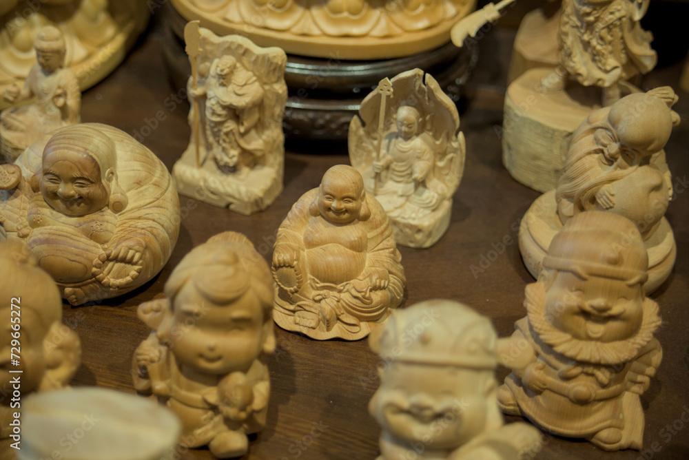 statue of a buddha in a temple, shopping, market, street, miniature, doll, dolls, figure, wooden, handmade, crafts, Taiwan, asian, buddhism, religion, culture