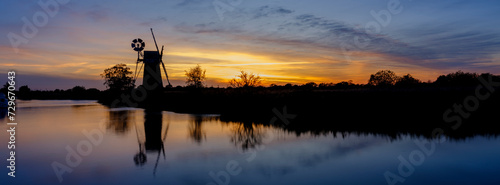 Sunset on Turf Fen Drainage Mill at How Hill, Norfolk, UK photo