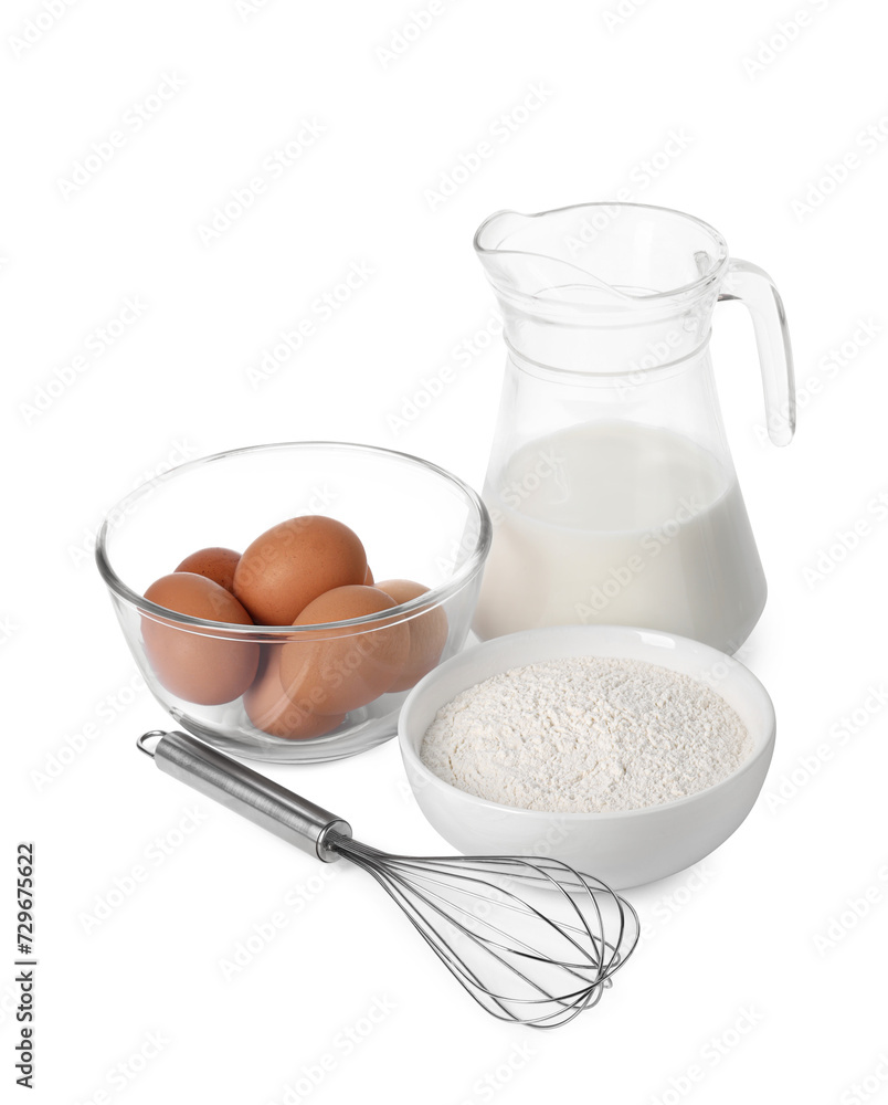Metal whisk, raw eggs, flour and jug of milk isolated on white Metal whisk, raw eggs, flour and jug of milk isolated on white