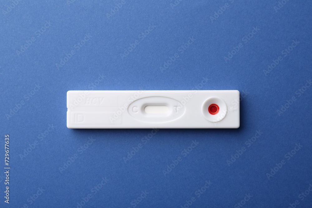 Disposable express test on blue background, top view Disposable express test on blue background, top view