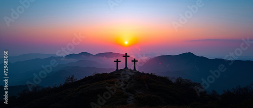 Christian Easter concept. Resurrection of Jesus Christ. Silhouette of three crosses on mountain summit.
