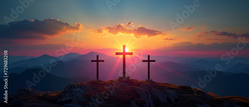 Christian Easter concept. Resurrection of Jesus Christ. Silhouette of three crosses on mountain summit.