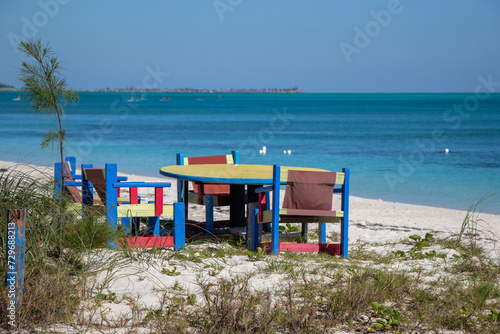 colourful wooden furniture on a beach photo