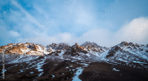 snow covered mountains © tylermyates