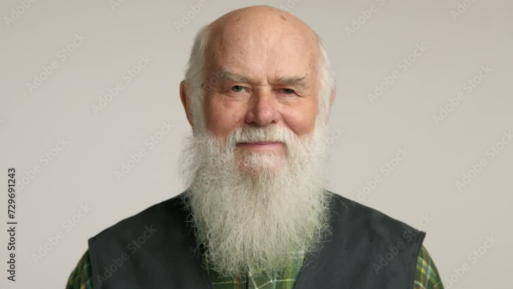 A close-up of a jovial senior man showing his playful side by sticking out his tongue, dressed in a plaid shirt and vest, portraying a fun-loving and youthful spirit. Camera 8K RAW. A close-up of a jovial senior man showing his playful side by sticking out his tongue, dressed in a plaid shirt and vest, portraying a fun-loving and youthful spirit. Camera 8K RAW.