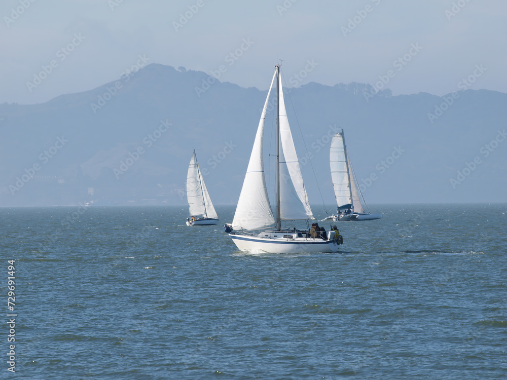 Three Sailboats Sailing On San Francisco Bay