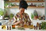 African American woman creating essential oil blends in a bright, plant-filled home apothecary.