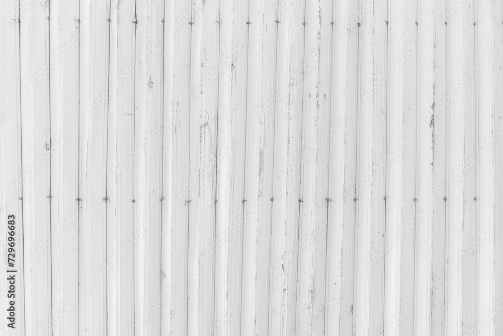 Old White corrugated iron metal sheet texture surface. Industrial steel silver background. Old White corrugated iron metal sheet texture surface. Industrial steel silver background.