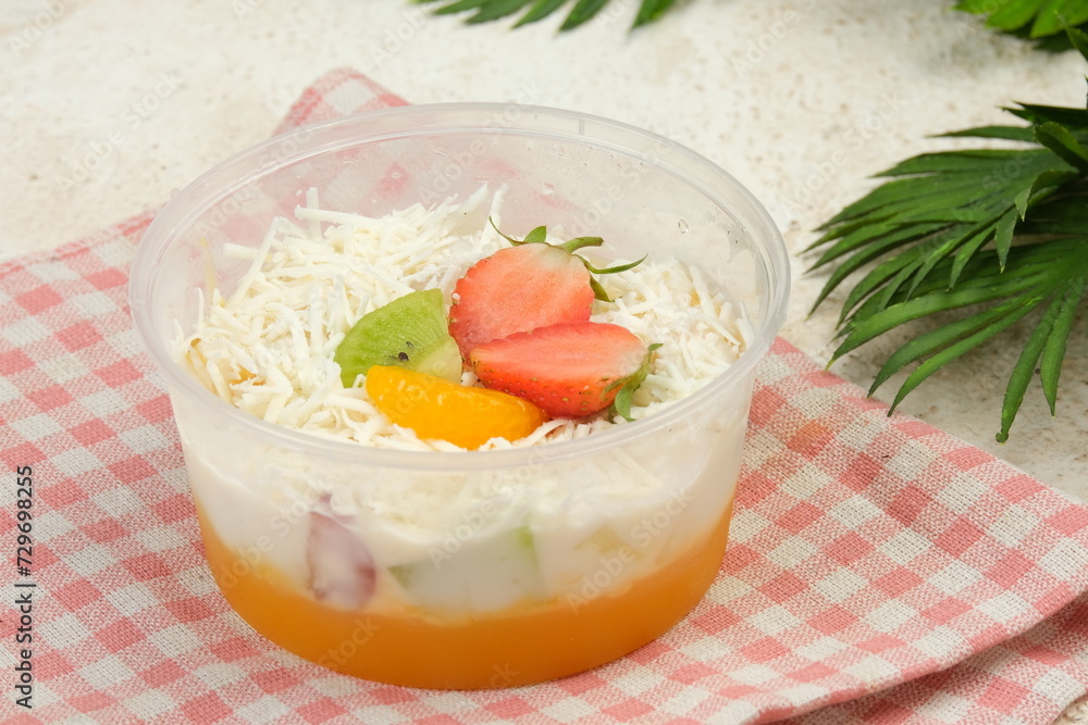 Bowl of Healthy Fresh Fruit Salad or Salad Buah on White Background Bowl of Healthy Fresh Fruit Salad or Salad Buah on White Background
