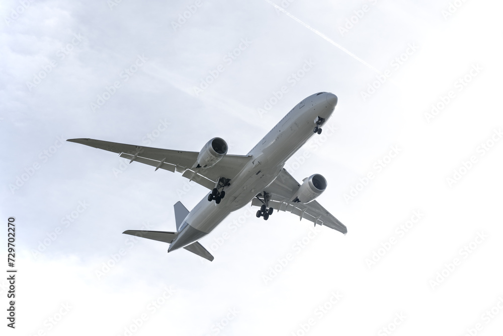 Watching the descent of a passenger plane extending Watching the descent of a passenger plane extending