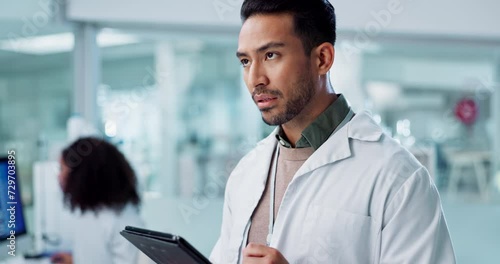 Man, thinking or scientist with tablet in laboratory or medical research of genetics in healthcare. Asian doctor, reading or idea on digital pharmaceutical database or medicine breakthrough on tech photo