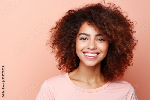 Portrait of a beautiful young african american woman with curly hair